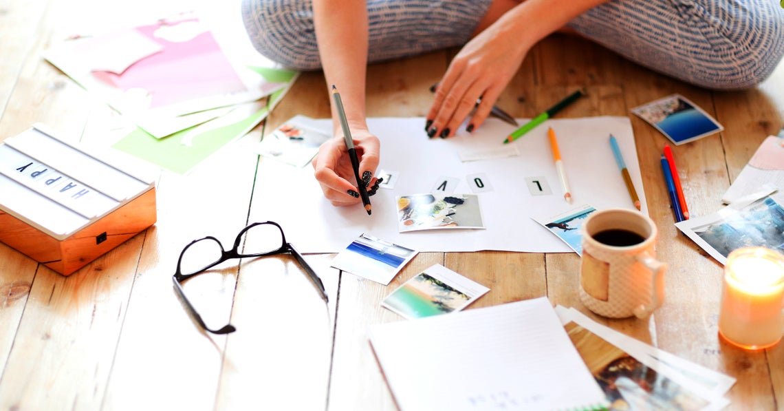 woman creating a vision board