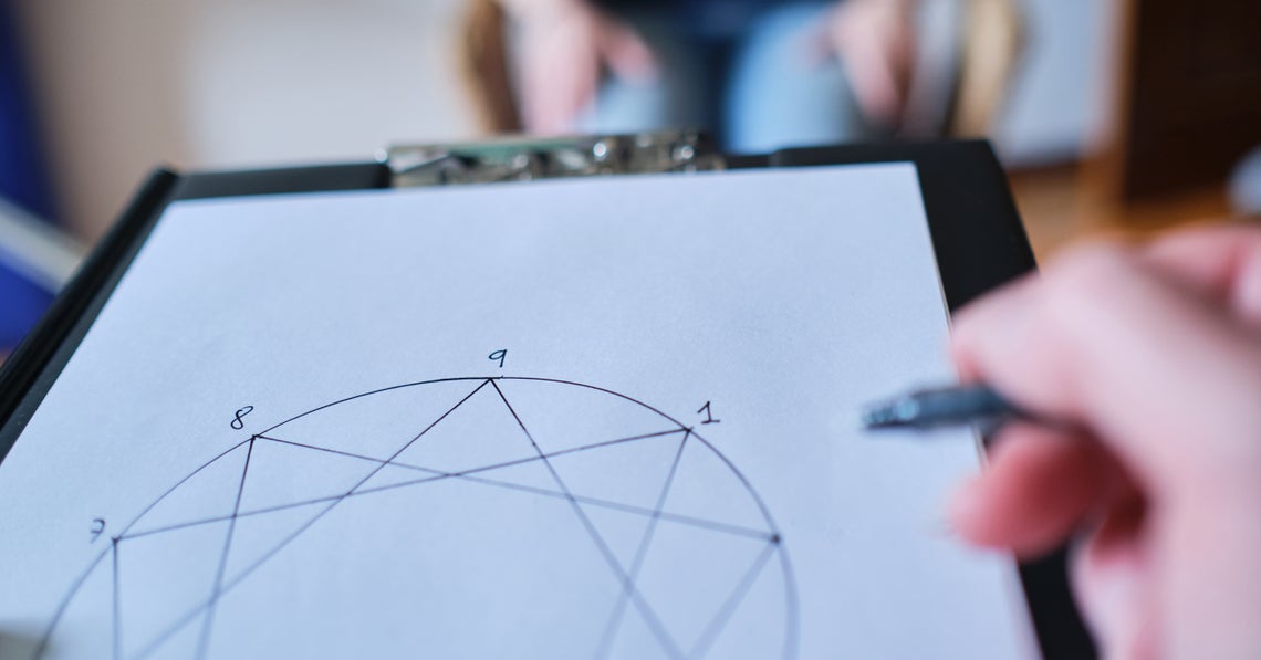 therapist drawing an ennegram during a session