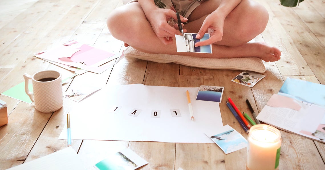 woman making a vision board