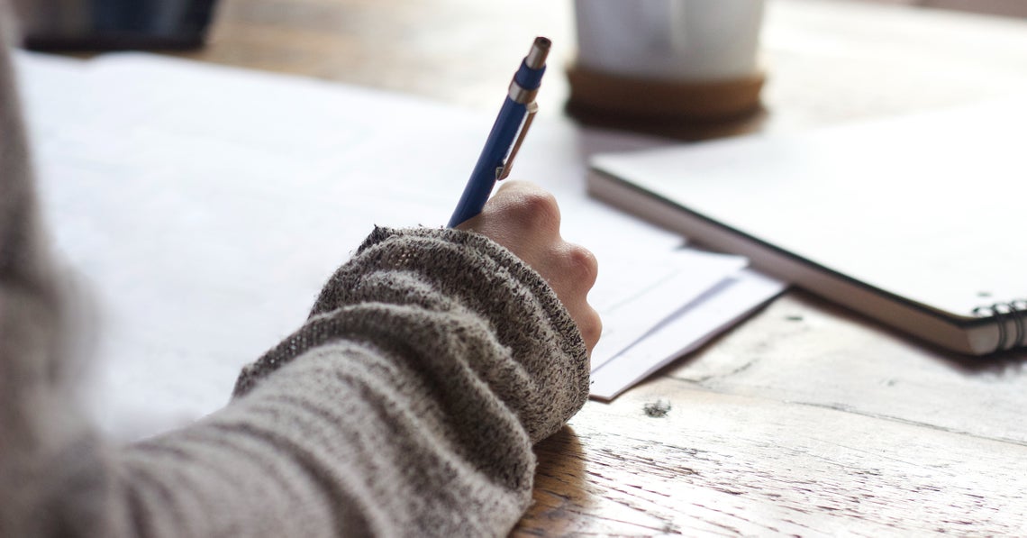 woman practicing stram of consciousness writing