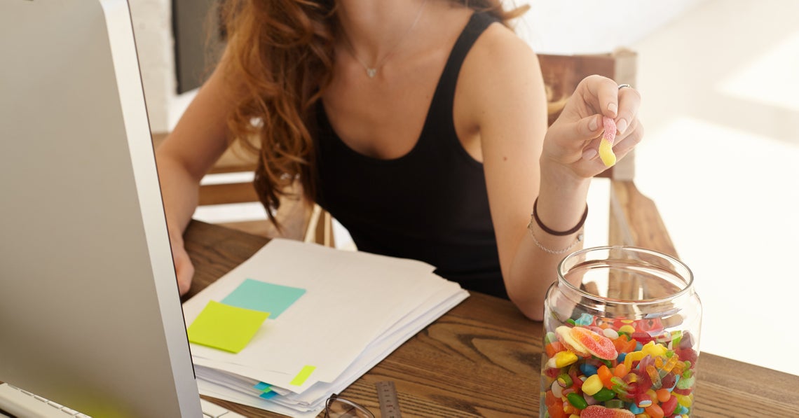 young woman having sugar cravings