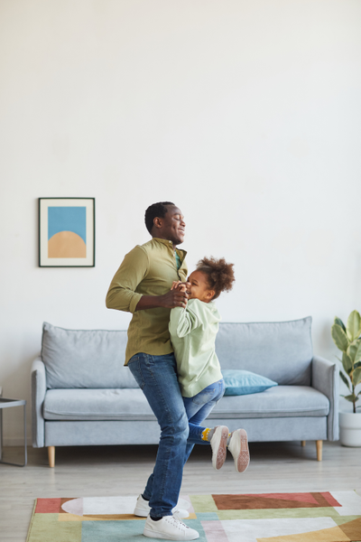 Father and daughter dancing.
