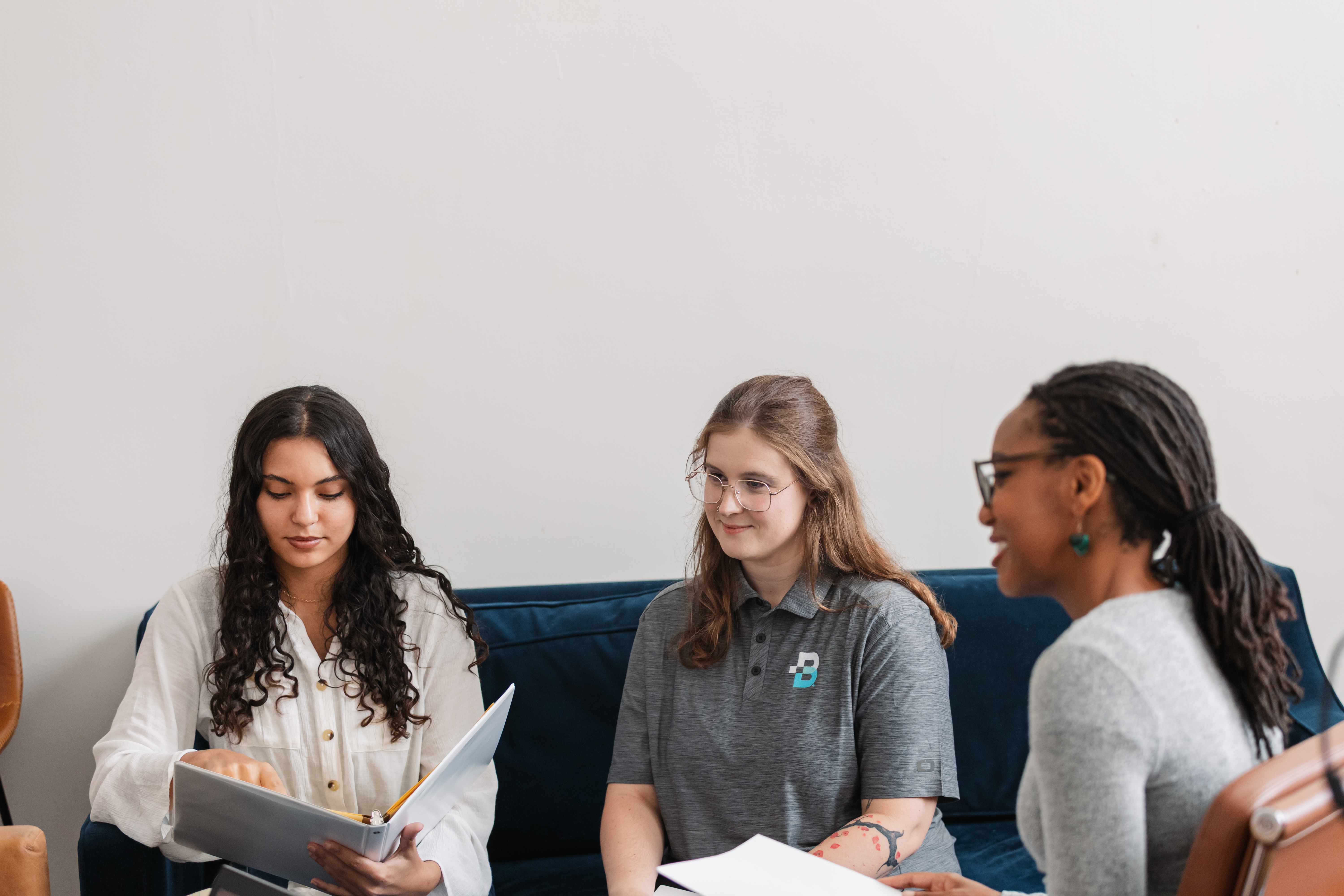 Bethany employees in a meeting.