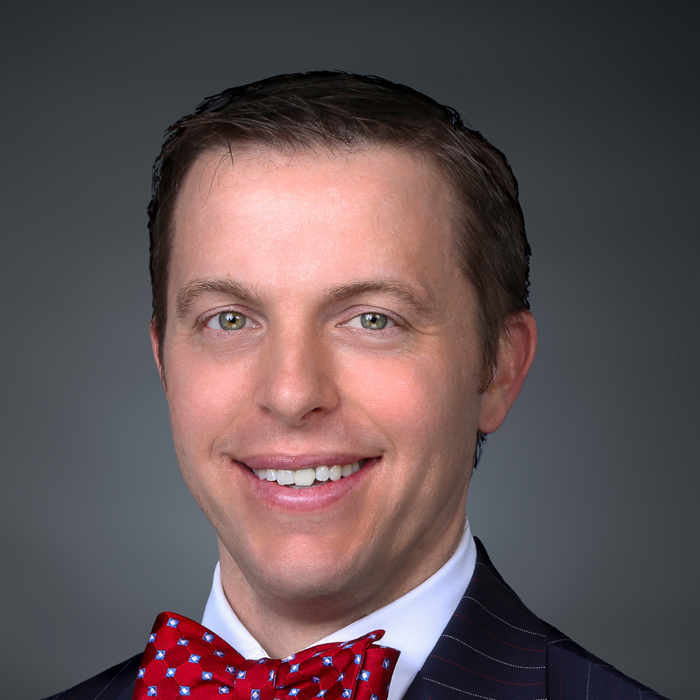 Portrait of Luke Madigan, MD