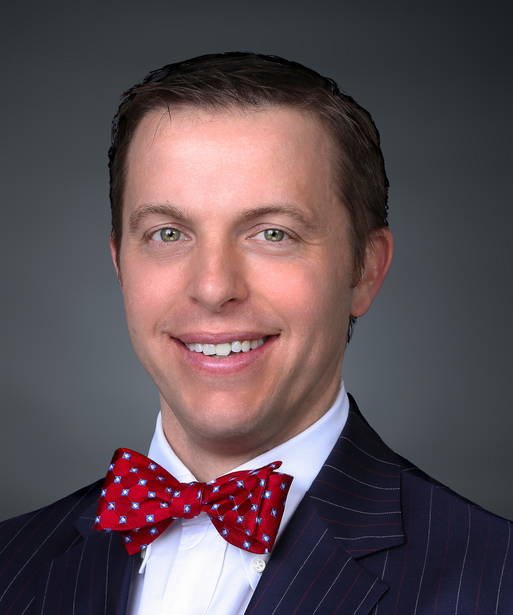 Portrait of Luke Madigan, MD