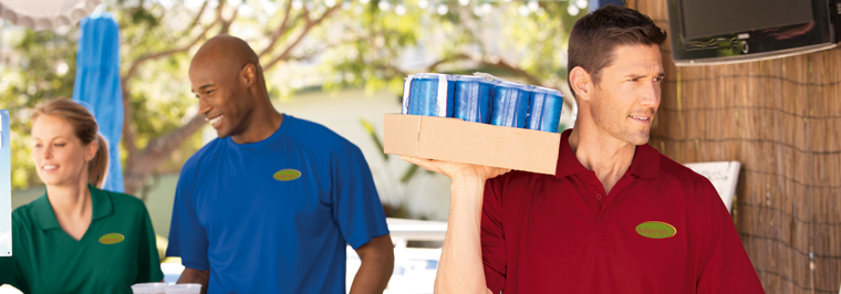 Three restaurant workers outside staying cool at work