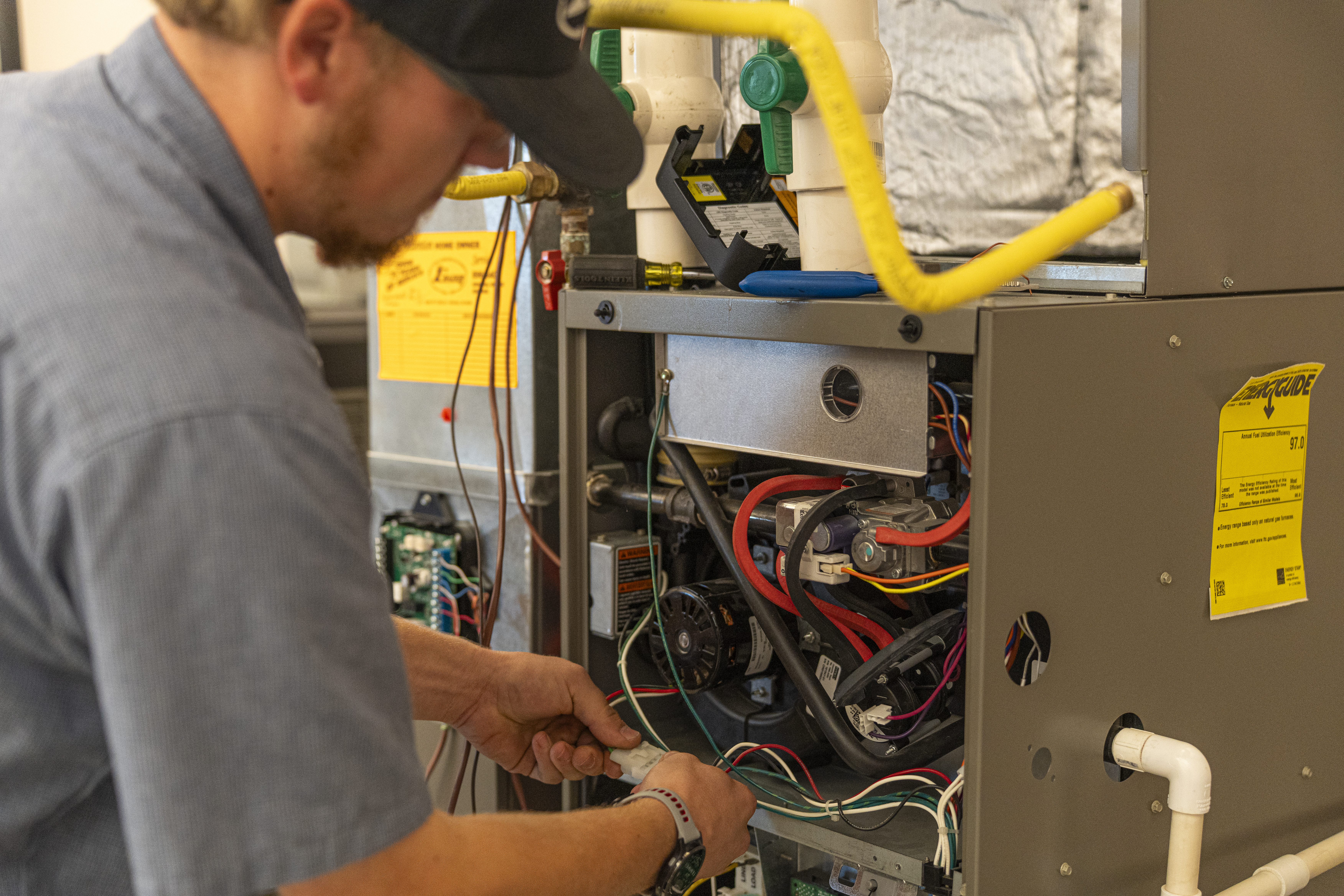 Frazier Company tech working on furnace