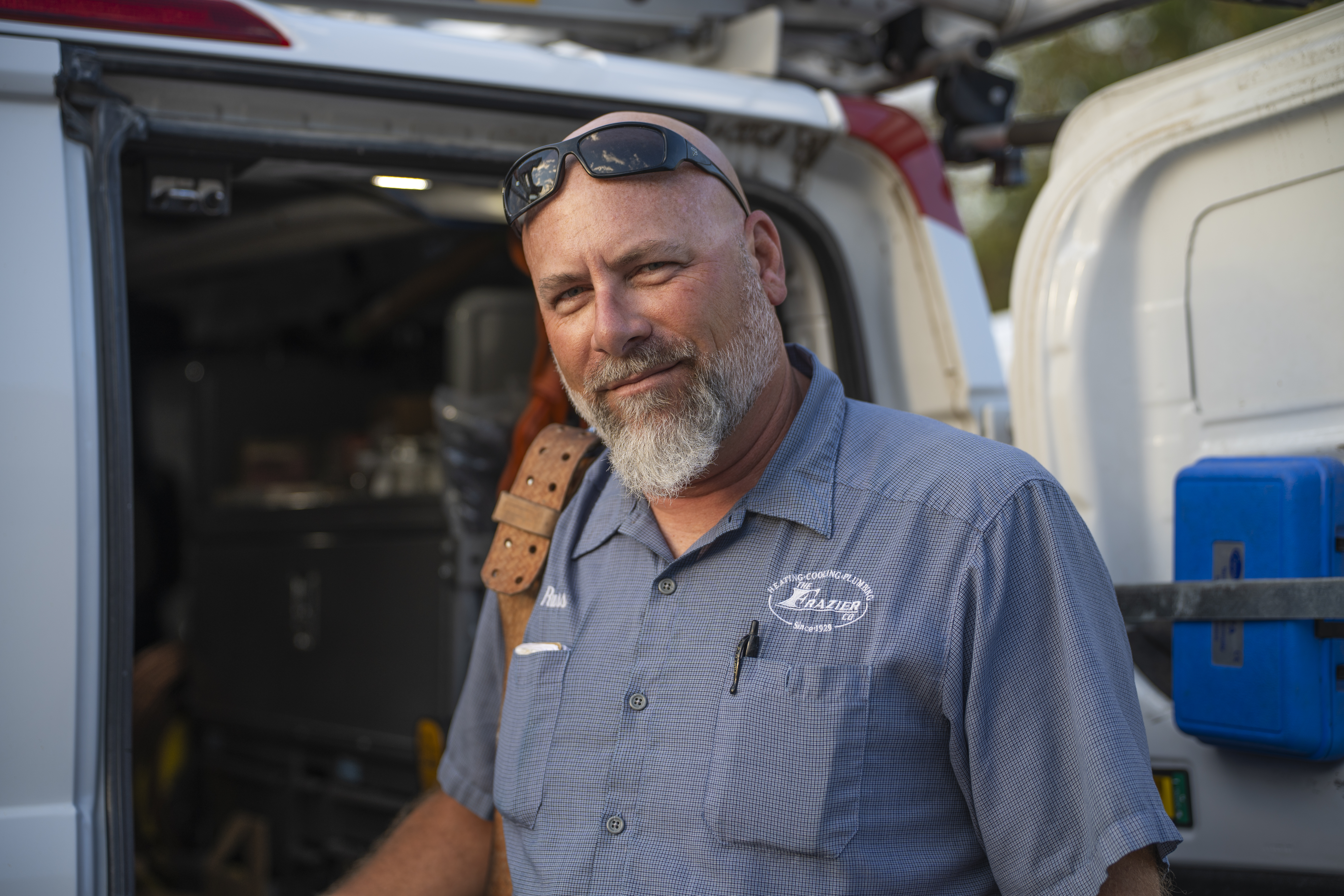 Tech in front of van