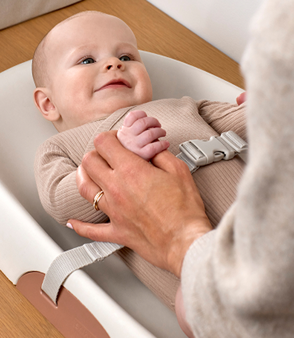 Baby on changing pad