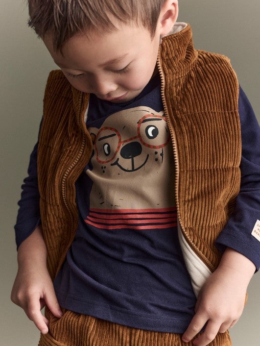 boy in otter avenue sweatshirt and corduroy vest