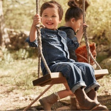 toddler boy on swing