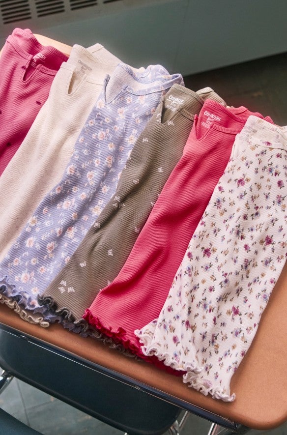 line of shirts on desk