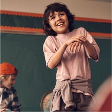 Boy smiling in classroom