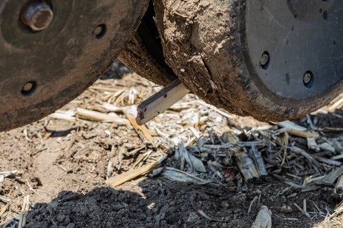 Close-up of a Keeton Seed Firmer during planting