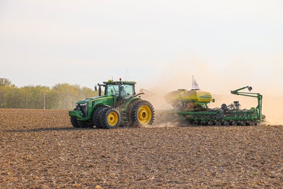 John Deere MaxEmerge XP planter upgraded with Precision Planting row unit attachments.