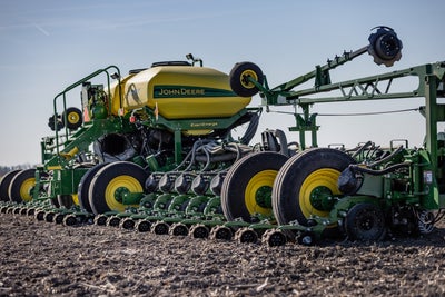 A John Deere planter equipped with FurrowForce, a two-stage closing system, from Precision Planting. 