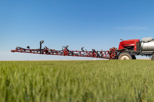 Sprayer outfitted with SymphonyVision | Rate traveling across the field. 