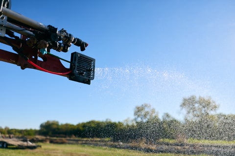 SmokeRow on the end of a spray boom utilizing two nozzles to ensure full coverage on the field edge.