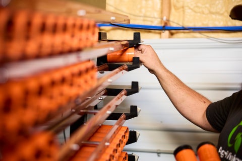 Person loading GeoTubes into Radicle Lab 