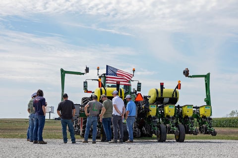Farmers comparing the CornerStone Planting System to traditional John Deere XP row units at the Precision Planting PTI Farm