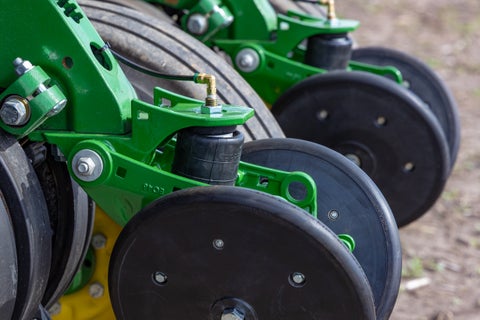 2 John Deere row units with the DuraClose system installed.
