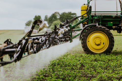 John Deere sprayer using SymphonyNozzle from Precision Planting