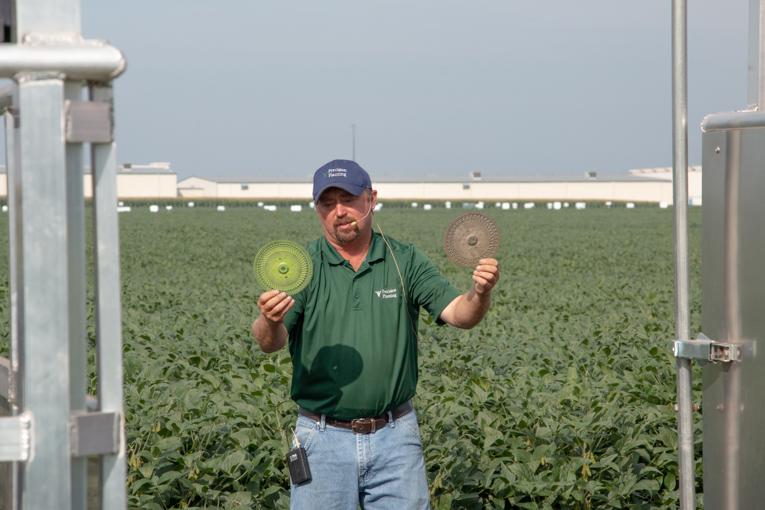 Agronomist with seed disks on the agronomy tour at the PTI Farm.