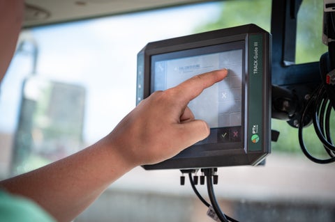 PTx Trimble Track-Guide III display in-cab running vSet and vDrive through the vConnect | Drive universal terminal.