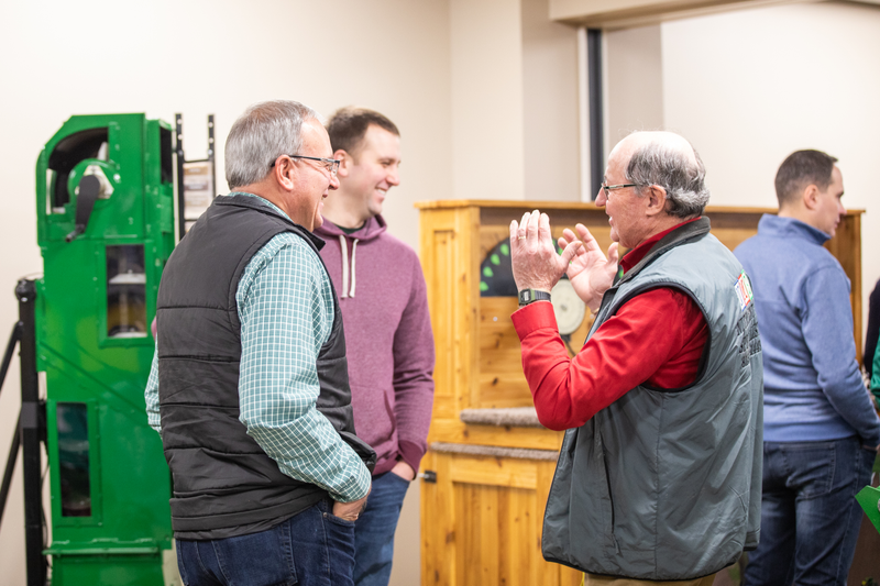 Growers and talking at Precision Planting's Winter Conference 2023