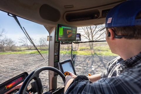 Gen 3 20|20 shown in the cab of a sprayer, monitoring and controlling Symphony.