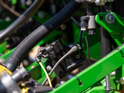 vApplyHD pump control module on a John Deere planter