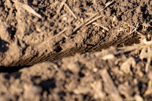 GeoKnife mechanically excavates a uniform slot across the soil profile.
