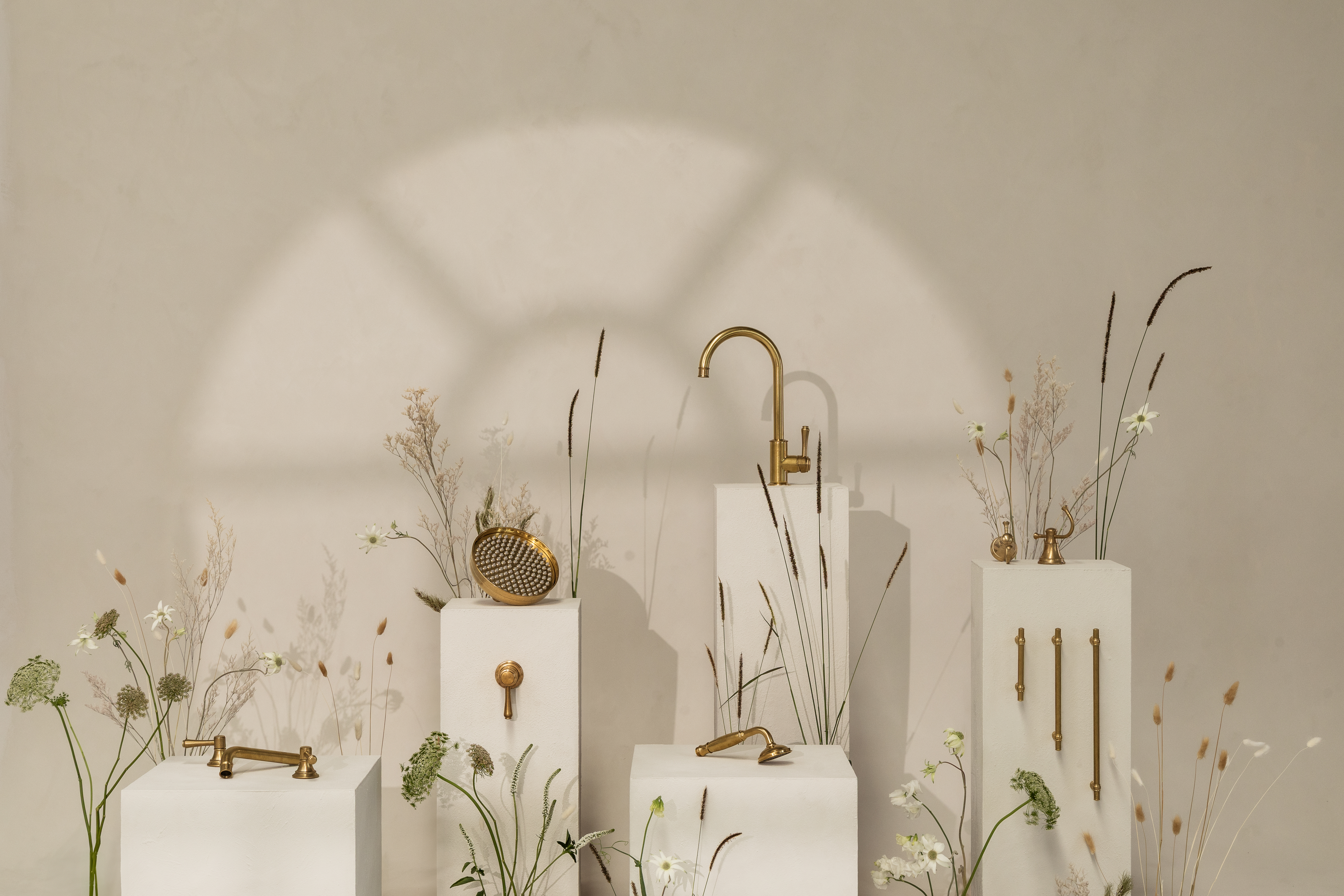 Kingsley tapware in Tumbled Aged Brass styled in a bathroom