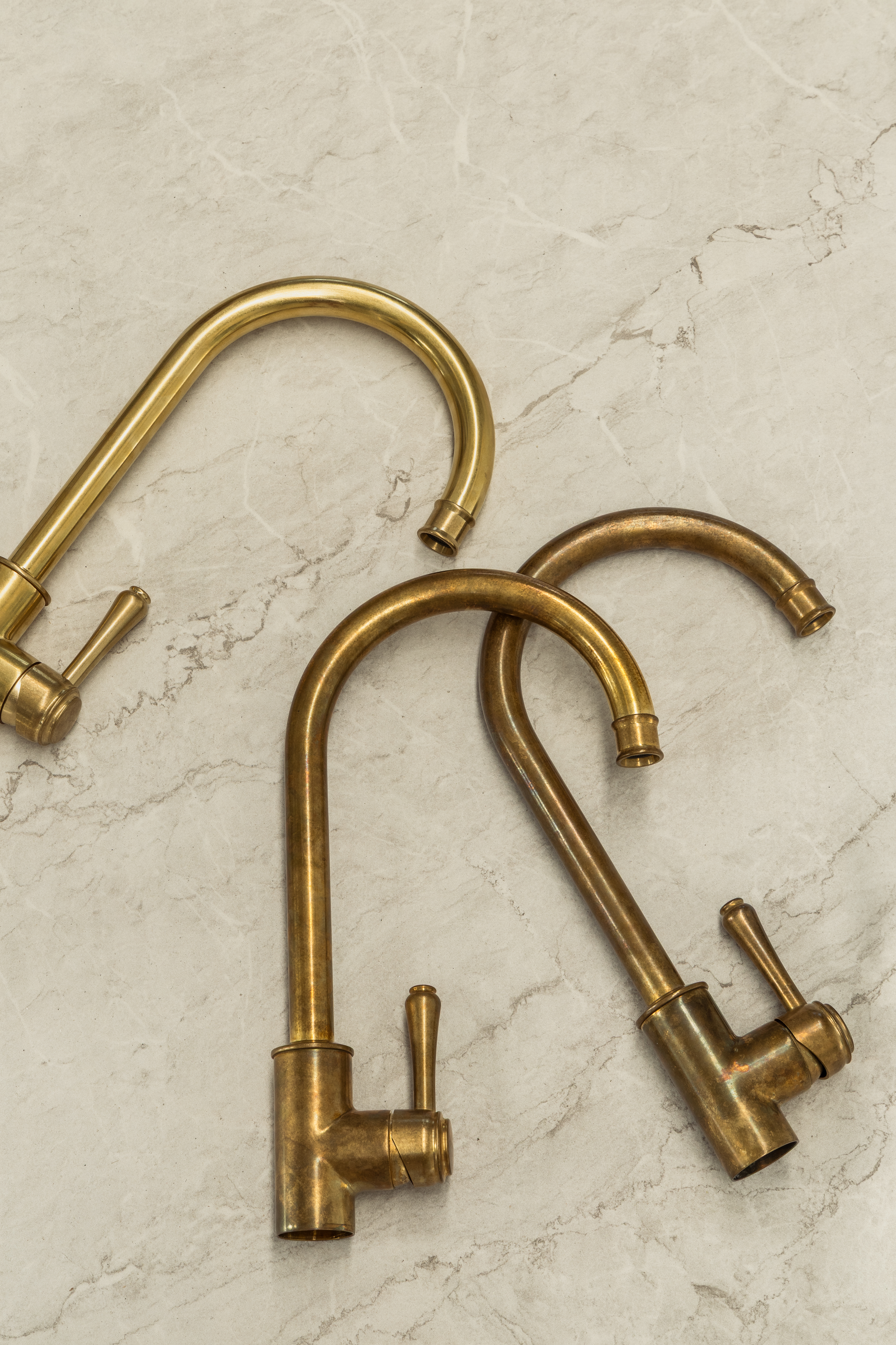 Tumbled Aged Brass beginning to deepen in tone