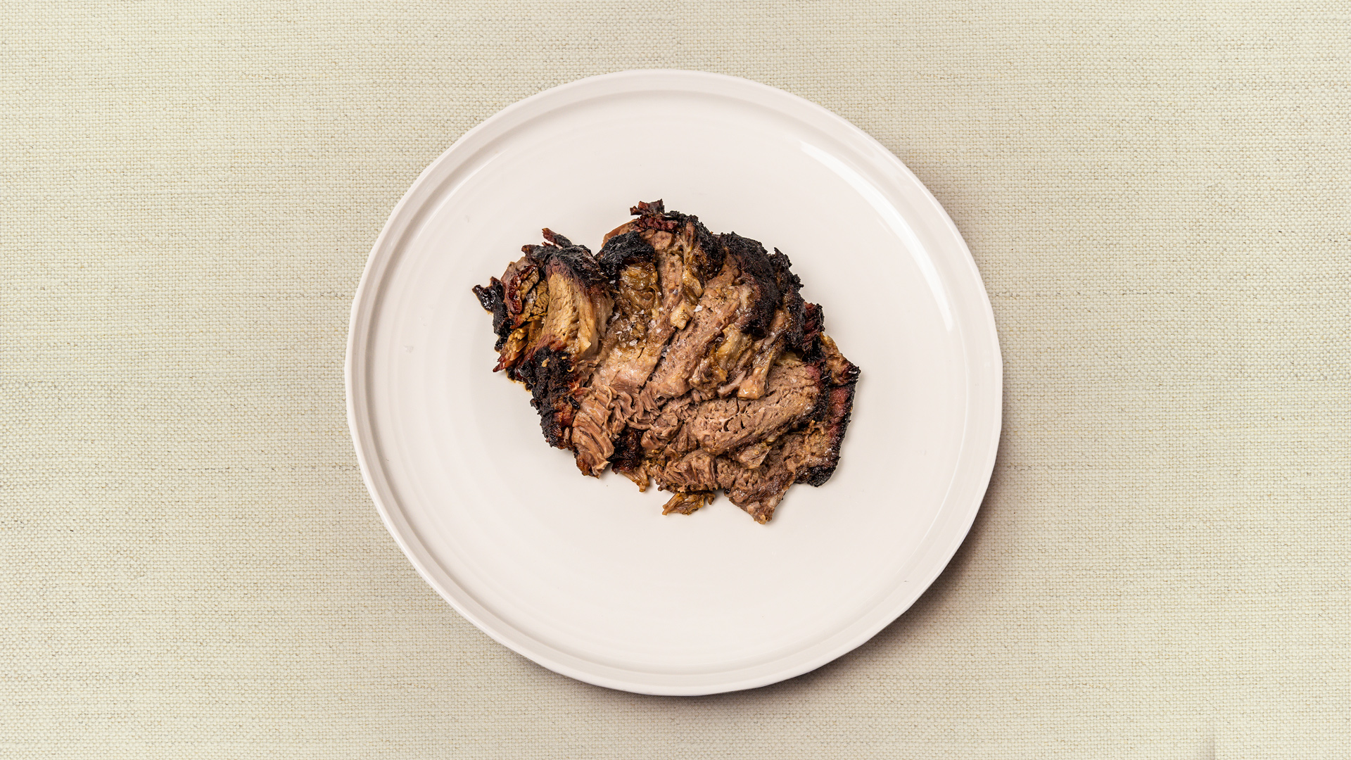 Smoky Beef Brisket (gf) - Sliced beef brisket slow-cooked in our smoker, until fork tender, served with your choice of sauce - our chef recommends the garden green chimichurri. (12-14 oz, gluten free, serves 2-3)