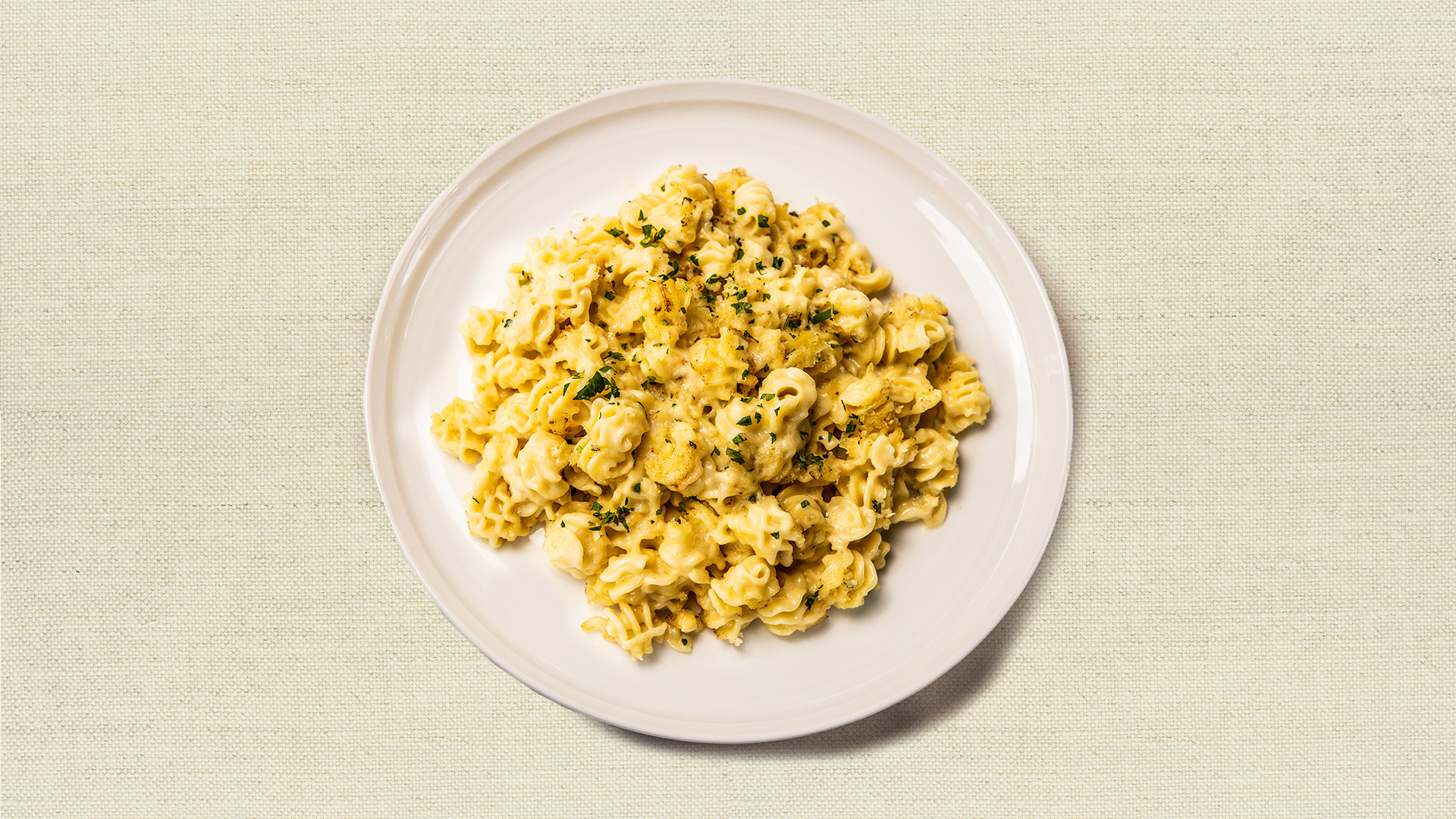 Classic Mac & Cheese - Traditional mac and cheese made with four cheese sauce and radiatori pasta with a crispy breadcrumb topping. (12 oz, vegetarian, serves 2-3)