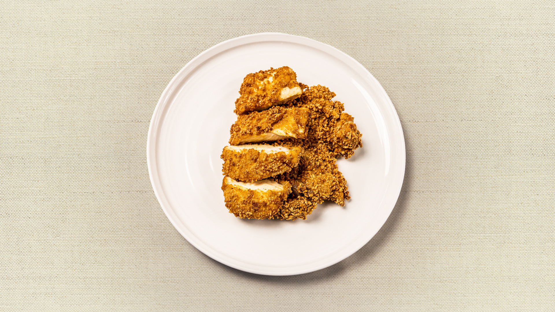 Crispy Herb-Breaded Chicken (gf) - Springer Farms breaded chicken breast and thigh with fresh herbs and seasonings, served with your choice of sauce - our chef recommends mama’s marinara or house-made ranch. (14-15 oz, gluten free, serves 2-3)