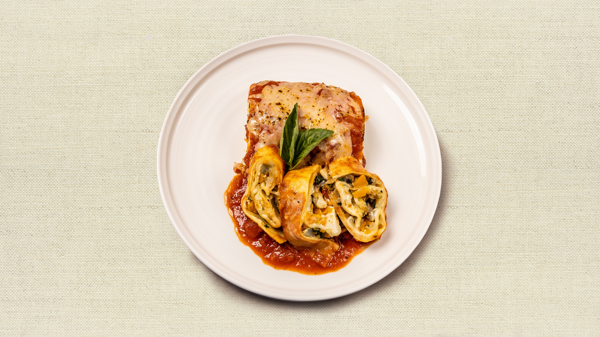 Mama’s Lasagna - Italian lasagna rollatini (meat or veggie) like mama used to make - fresh marinara, ricotta and veggies. Served with fresh shaved parmesan. (1 lbs +, serves 2-3)