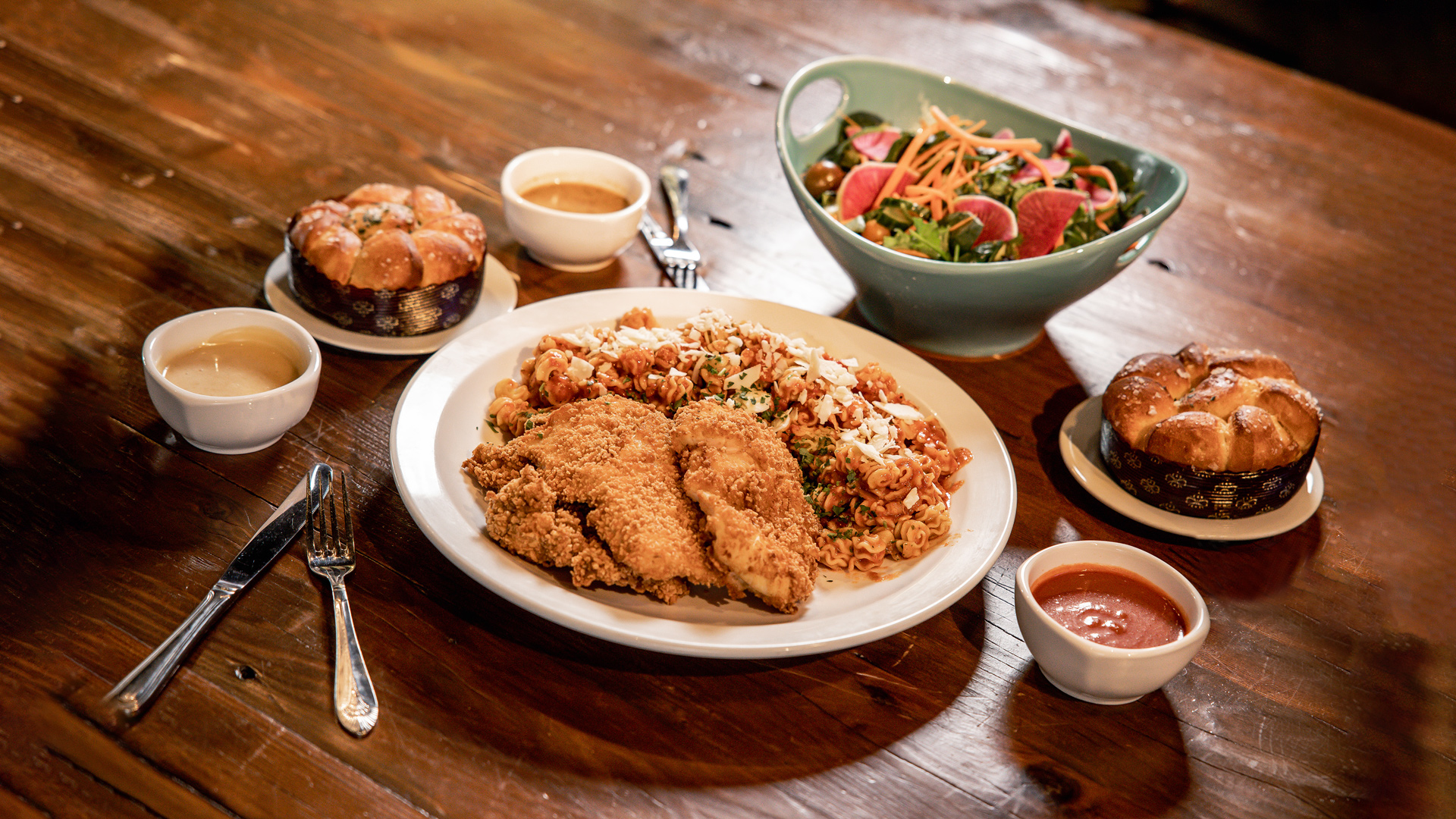 Crispy Herb-Breaded Chicken Meal - Springer Farms breaded chicken breast and thigh (14-15 oz) served with radiatori pasta, mama’s marinara, fresh greens salad with white balsamic vinaigrette, and fluffy, pull apart Parker House rolls - choice of sauce (serves 2-3).