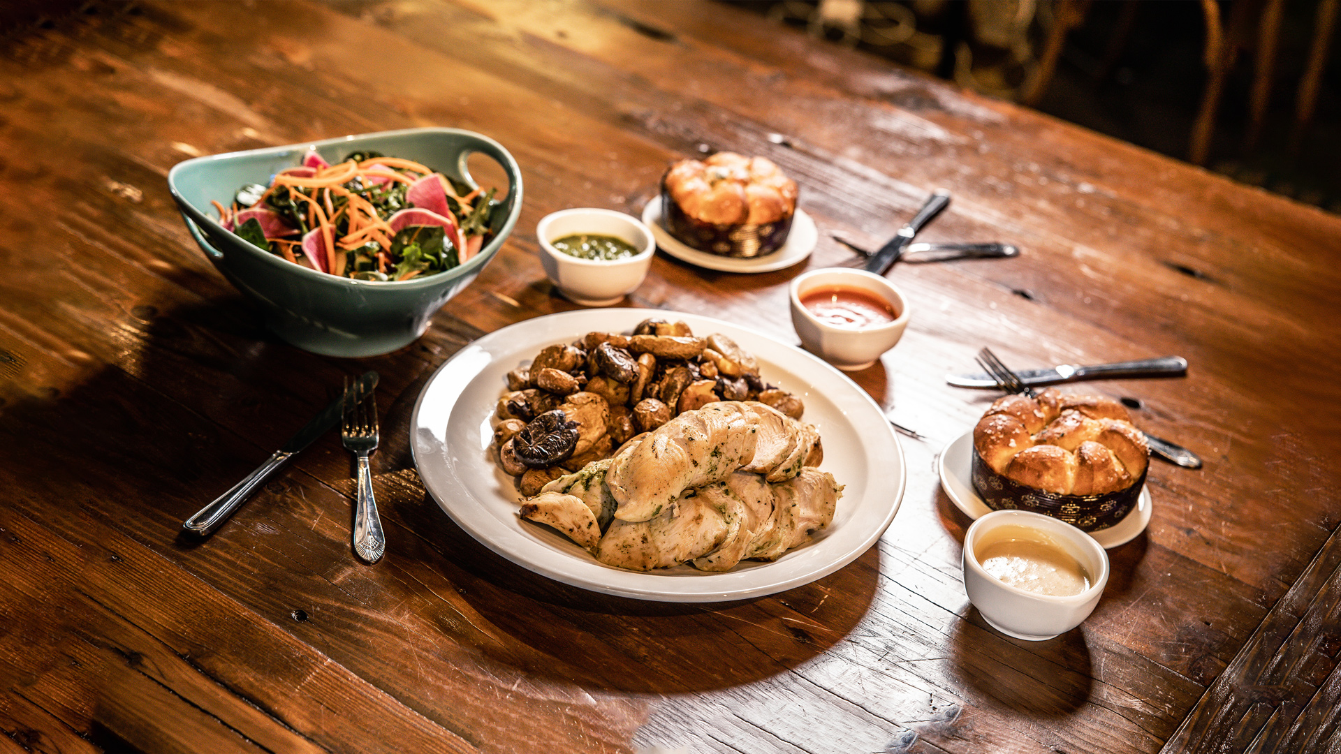 Tender Roasted Chicken Breast Meal - Two Mary’s chicken breasts (6-9 oz each) served with crispy smashed potatoes, fresh greens salad with white balsamic vinaigrette, and fluffy, pull-apart Parker House rolls - choice of sauce (serves 2-3).