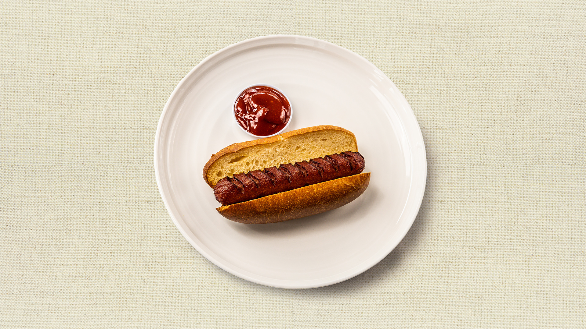 Ripper Dog with Brioche Bun - One Schwarz hot dog with your choice of sauce - our chef recommends house-made ketchup. (4 oz, serves 1)