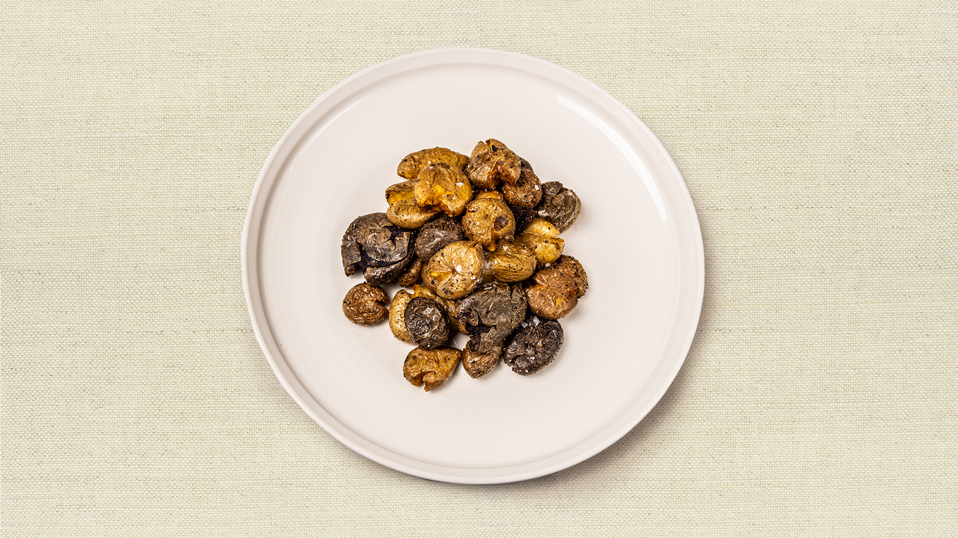 Crispy Smashed Potatoes (gf) - Fingerling potatoes smashed and cooked until golden, crunchy, delicious and dippable. (12-14 oz, gluten free, vegetarian, serves 2-3)