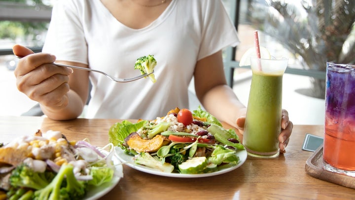 woman enjoying her lunch of fiber rich food