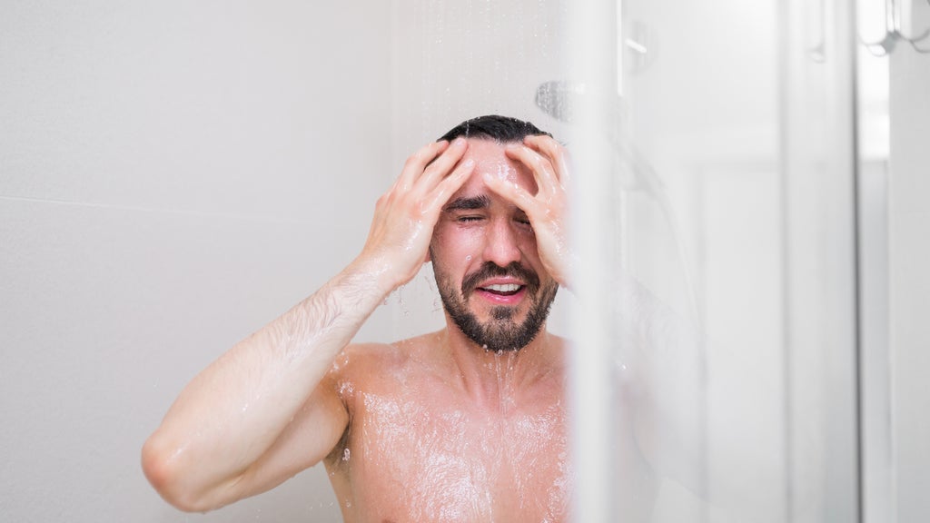 man taking shower in the morning