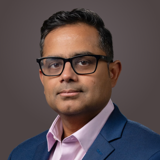 Corporate headshot of Devi Mateti