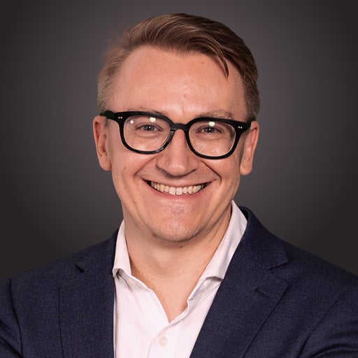 Corporate headshot of Craig Dargusch