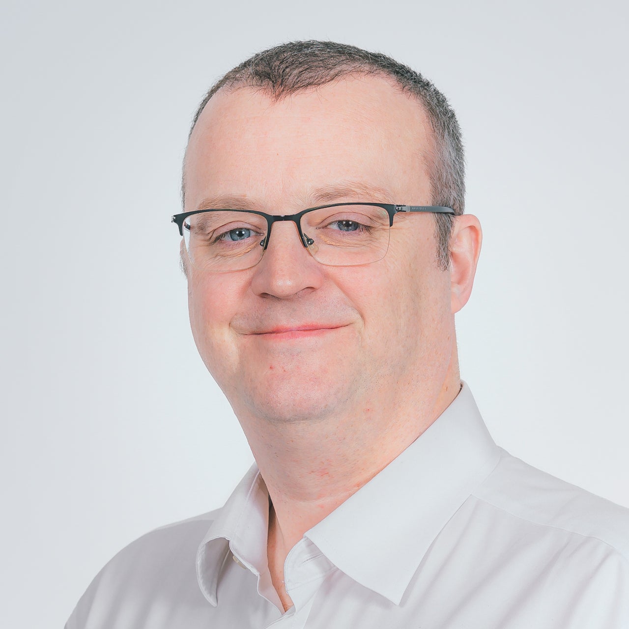 Corporate headshot of Carl Geraghty