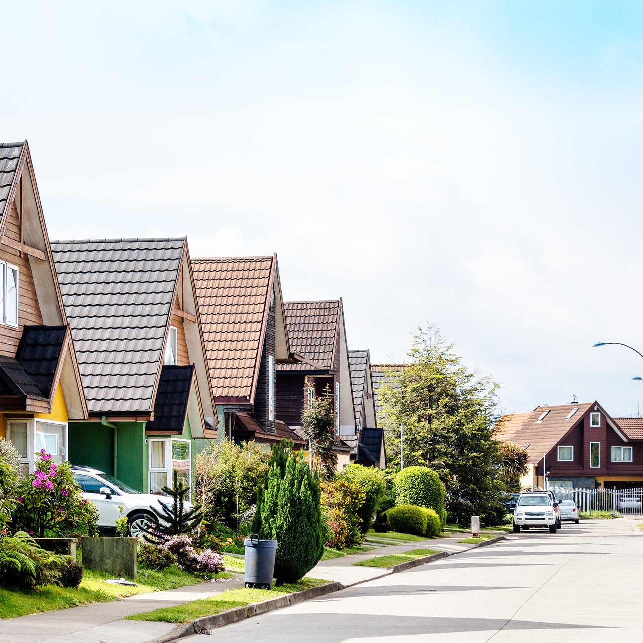 Row of similar houses representing a middle class neighborhood.