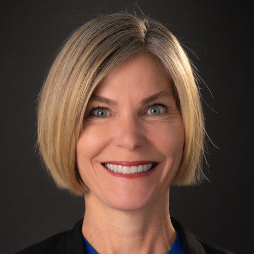 Corporate headshot of Kendra Angier
