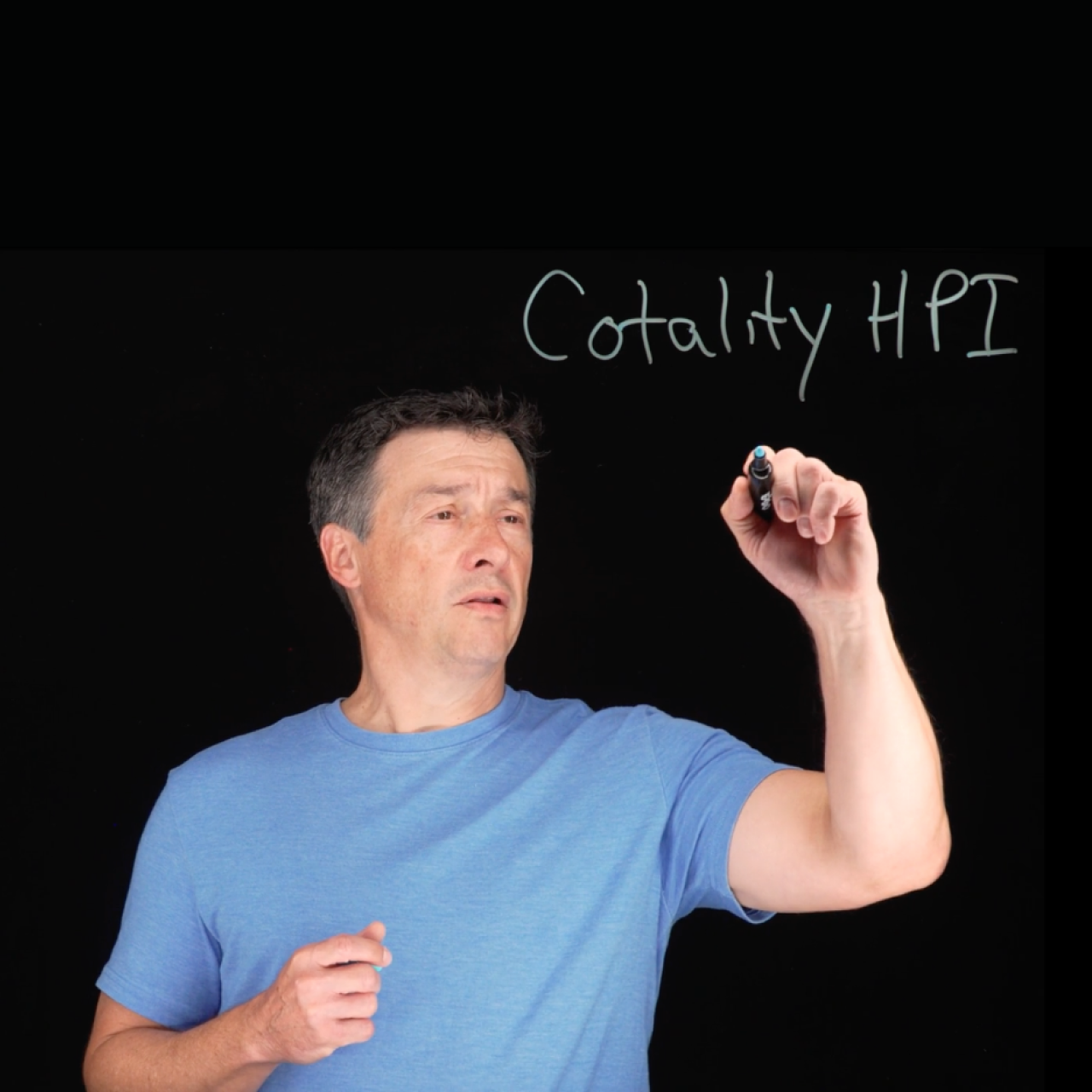 A product expert standing behind a lightboard with Cotality HPI written on the lightboard.